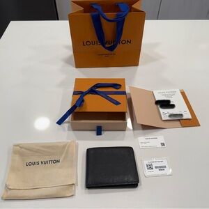 Louis Vuitton Black Taiga Slim Bi-Fold Wallet